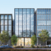 Glass-fronted office buildings at Arada Central Business District in Aljada, Sharjah, featuring modern design and smart infrastructure certified WiredScore Platinum.