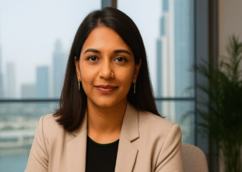 Portrait of Ritika Vohra, CEO of Dune Realty Advisory, at her boutique real-estate consultancy office in Dubai