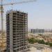 Treppan Tower by Fakhruddin Properties under construction in JVT, Dubai, offering smart homes ideal for Indian investors