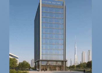 A modern commercial tower with a glass façade, located in a vibrant urban area of Dubai, surrounded by greenery and pedestrian-friendly spaces.