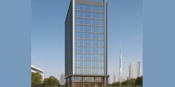 A modern commercial tower with a glass façade, located in a vibrant urban area of Dubai, surrounded by greenery and pedestrian-friendly spaces.