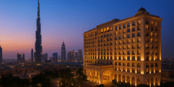 Dubai skyline with Burj Khalifa and luxury hotel at sunset, representing real estate investment opportunities