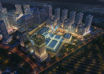 Aerial view of Azizi Milan community master plan in Dubai with modern residential towers, canal, and landscaped spaces.
