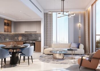 Luxury living room and kitchen interior at Azizi Milan Dubai real estate development, featuring modern design, sustainable finishes, and premium Dulux paints.