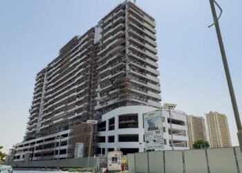 Azizi Grand Dubai Sports City under construction showing progress toward 2026 completion