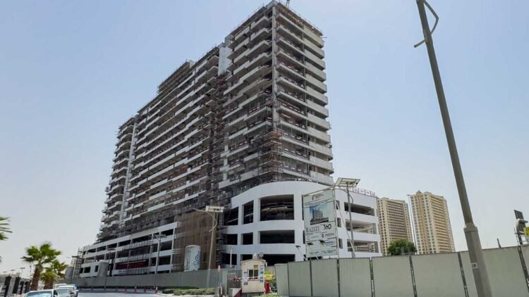 Azizi Grand Dubai Sports City under construction showing progress toward 2026 completion