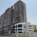 Azizi Grand Dubai Sports City under construction showing progress toward 2026 completion
