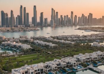 Abu Dhabi real estate market report highlights record growth in transactions and demand.