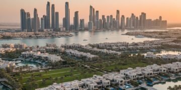 Abu Dhabi real estate market report highlights record growth in transactions and demand.