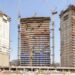 Azizi Rêve construction site showing façades and cranes at MBR City.