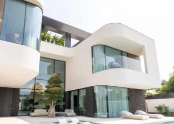 Exterior view of Kaia Villa Pearl Jumeirah Dubai showing modern architecture, pool deck, and rooftop terrace.