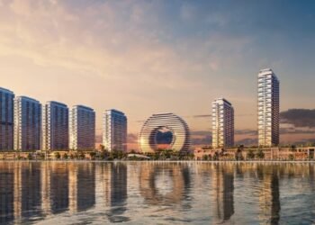 Sobha AquaCrest residential towers in Umm Al Quwain overlooking the Arabian Gulf with modern coastal architecture.