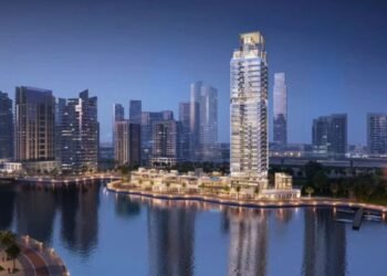 LIV Developers Dubai Marina pipeline showing waterfront towers and yacht marina at dusk with illuminated residential buildings