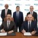 Executives from Royal Development Holding and Rotana sign an agreement for Abu Dhabi branded residences investment on Al Reem Island, marking a new residential partnership.