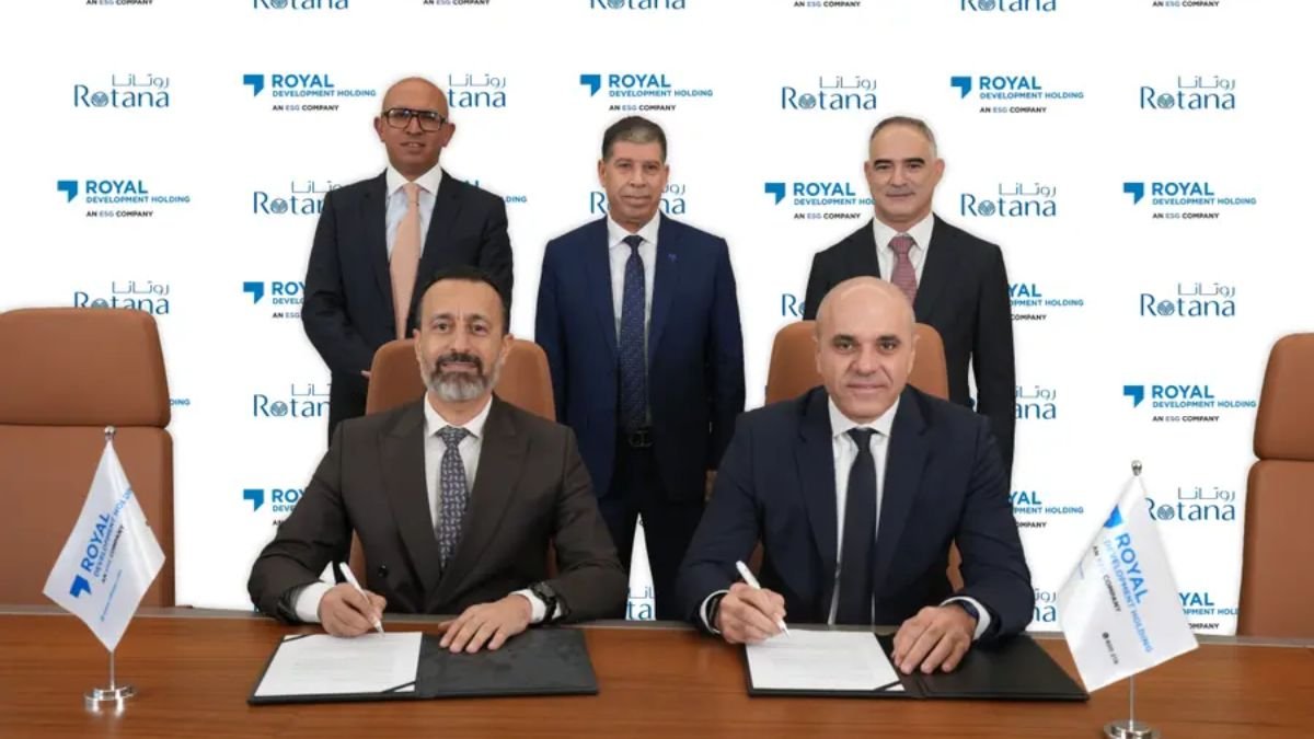 Executives from Royal Development Holding and Rotana sign an agreement for Abu Dhabi branded residences investment on Al Reem Island, marking a new residential partnership.