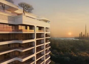 Modern mid-rise residential building in Al Jaddaf, Dubai, illustrating a wellness-led off-plan housing development with city skyline views.