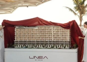 Jumeirah Garden City residential demand illustrated by mid-rise apartment buildings in central Dubai.