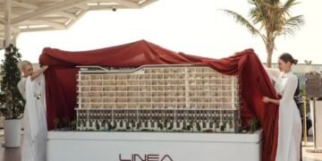 Jumeirah Garden City residential demand illustrated by mid-rise apartment buildings in central Dubai.