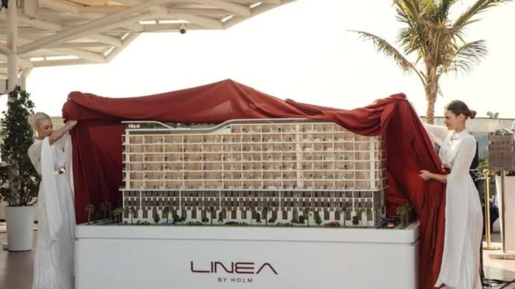 Jumeirah Garden City residential demand illustrated by mid-rise apartment buildings in central Dubai.