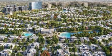 Dubai South construction near Al Maktoum Airport showing Dubai South project construction contract activity