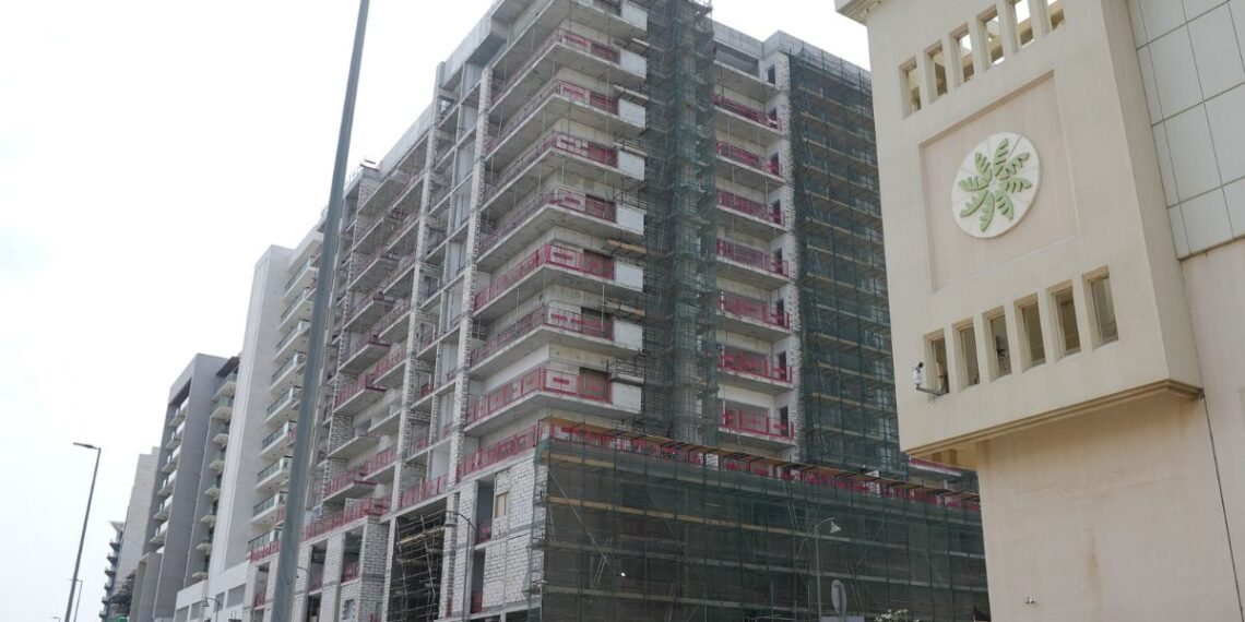 Azizi Zain residential development construction site in Al Furjan Dubai showing structural completion progress