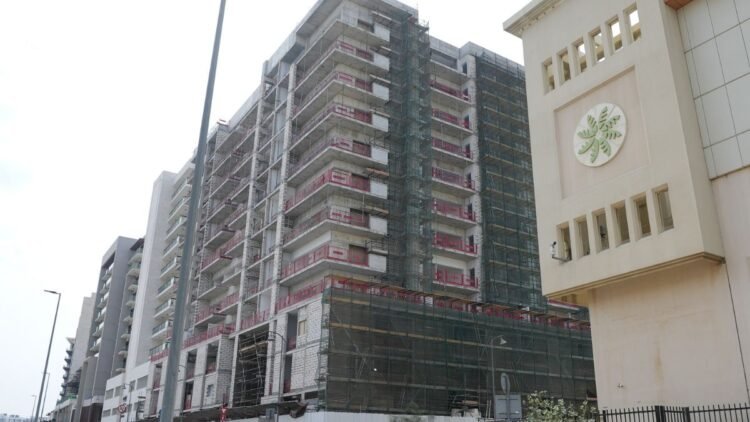 Azizi Zain residential development construction site in Al Furjan Dubai showing structural completion progress