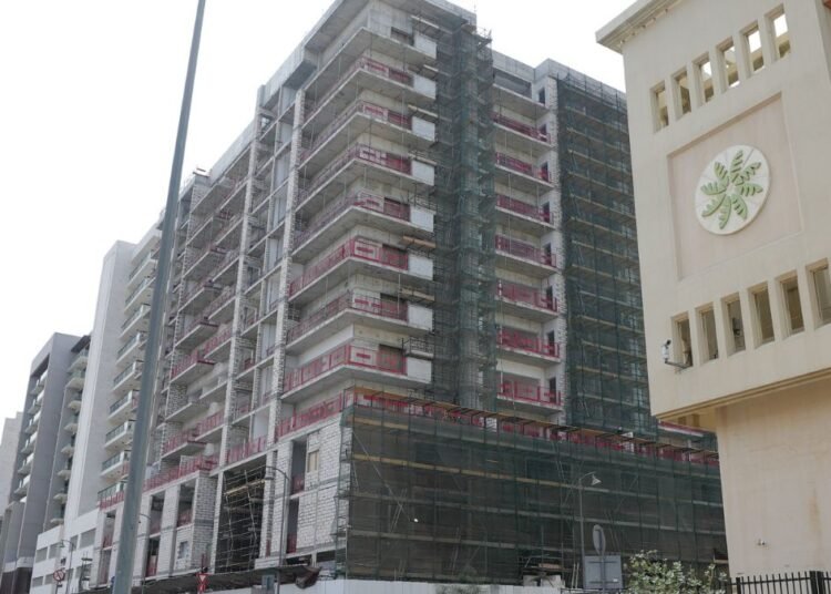 Azizi Zain residential development construction site in Al Furjan Dubai showing structural completion progress