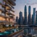 Waterfront tower in Dubai illustrating the Dubai branded residences premium, with hotel-branded apartments overlooking the marina at dusk