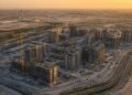 Aerial view of Dubai South residential towers under construction illustrating Dubai property market concentration in June 2026