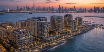Waterfront branded apartment towers at Dubai Maritime City, the coastal district behind Dubai football-branded residences such as DAMAC's Chelsea project