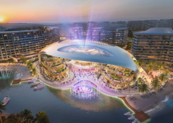 Residential towers under construction in Dubai South as Dubai off-plan handovers reach an 18-year high