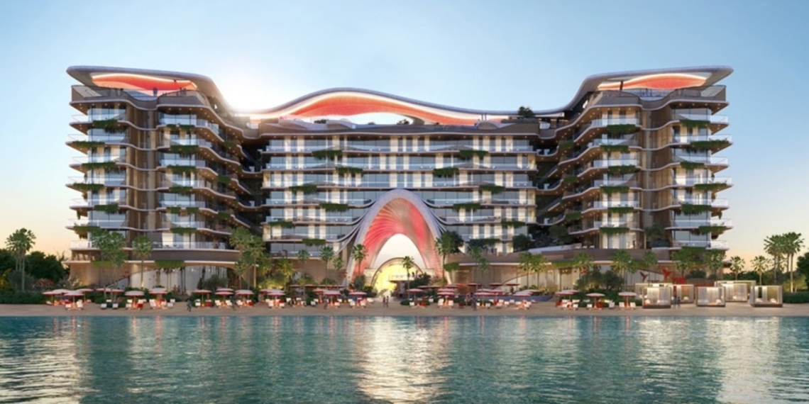 Topped-out concrete frame of The Unexpected Al Marjan Island Hotel & Residences in Ras Al Khaimah with façade work under way.